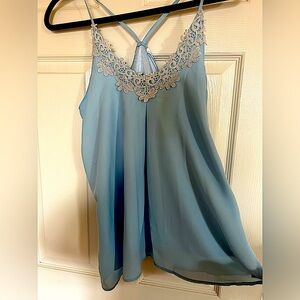 Elegant sky blue lace trim racer back top